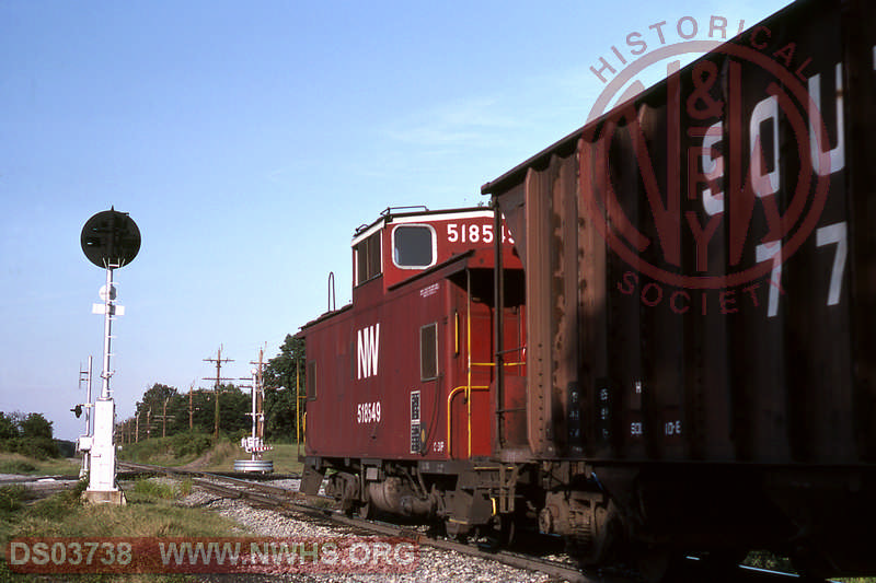 N&W caboose 518549 on rear of westbound freight at Elam, VA