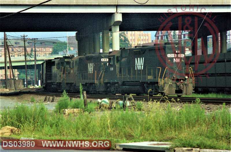 N&W GP35 #1316, GP9 #686 & GP35 #1308. eastbound at Roanoke, VA in August 1982