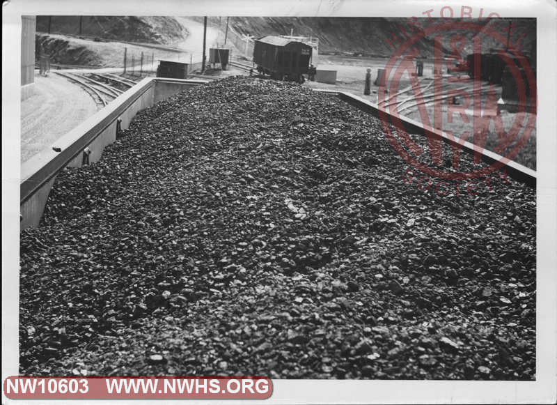 Closeup view of top of loaded coal hopper