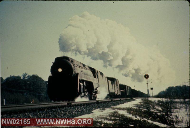  Class J No. 610 with Freight Train,Color,Front Left 7/8 View