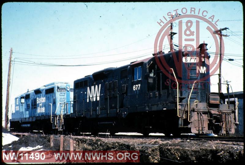 N&W EMD GP9 #677 and B&M GP18 #1755 at Boston, MA