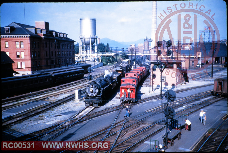 Busy view of Motive Power Building, Roanoke Passenger Station, and Roanoke Shops