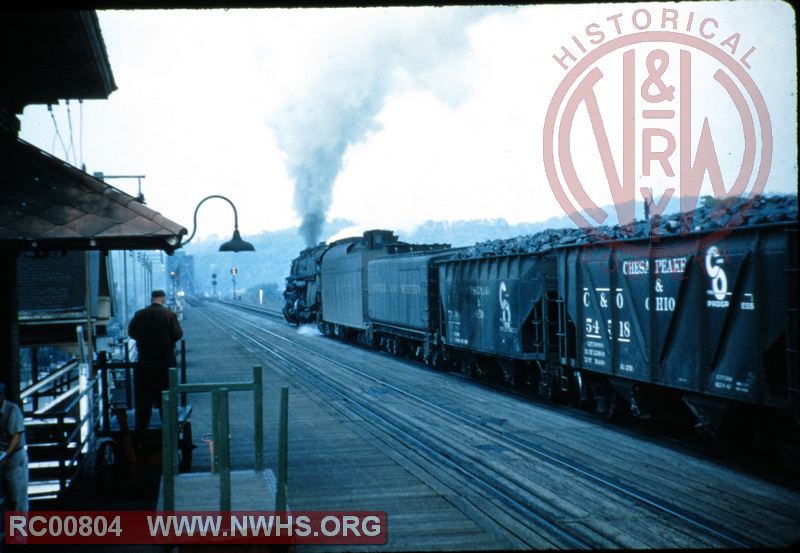 Train load of coal heading west through the Kenova Passenger Station